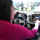 My wife, seen here putting the infotainment system on the new Ford Escape through its paces at the 2013 NAIAS.